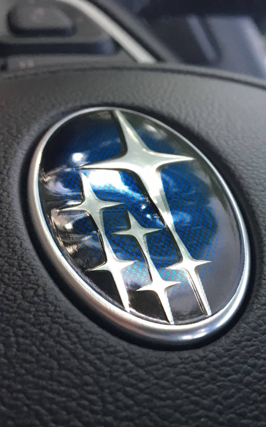 Subaru Logo On A Steering Wheel Wallpaper