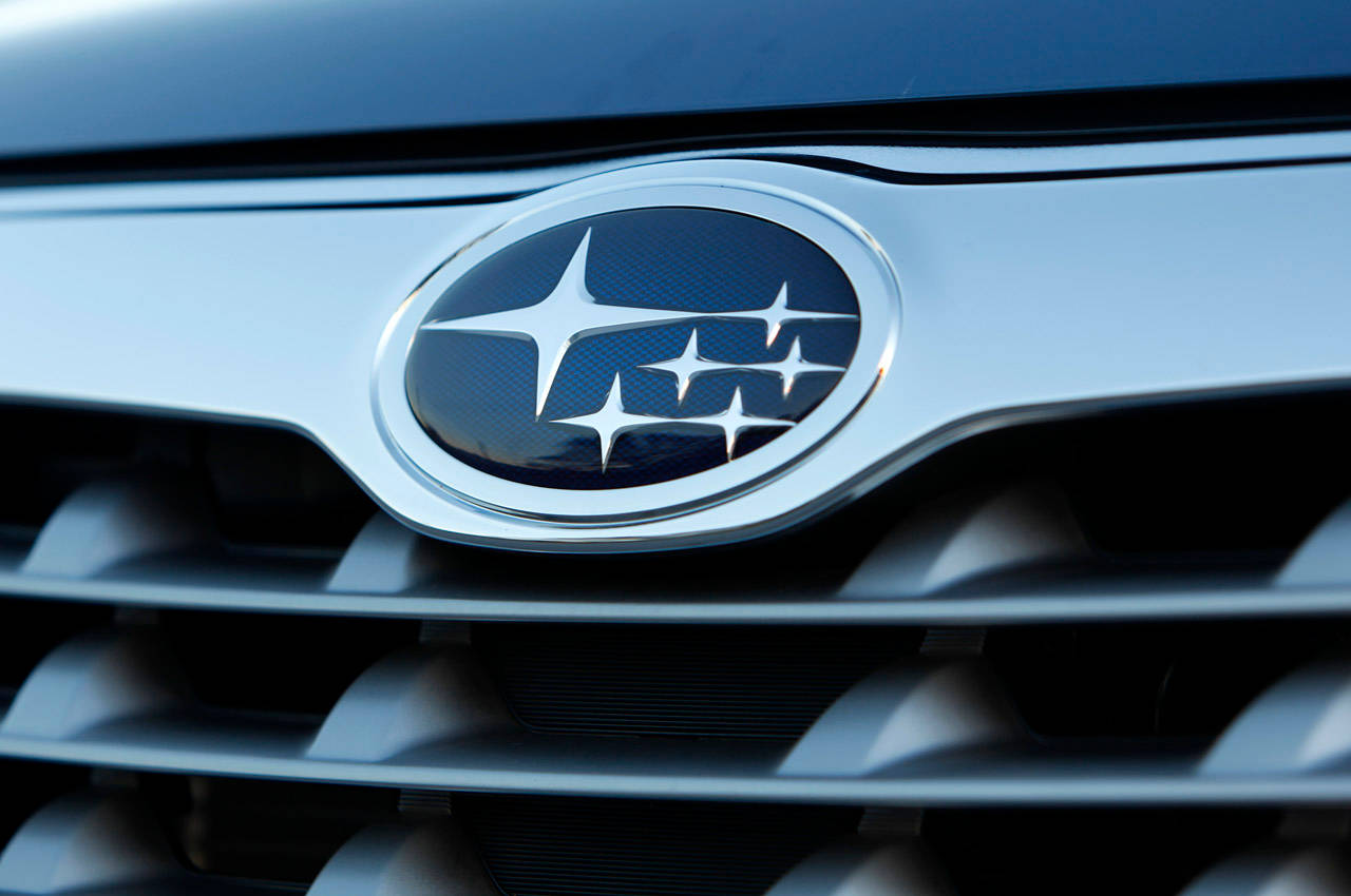 Subaru Logo On Car Grill Wallpaper