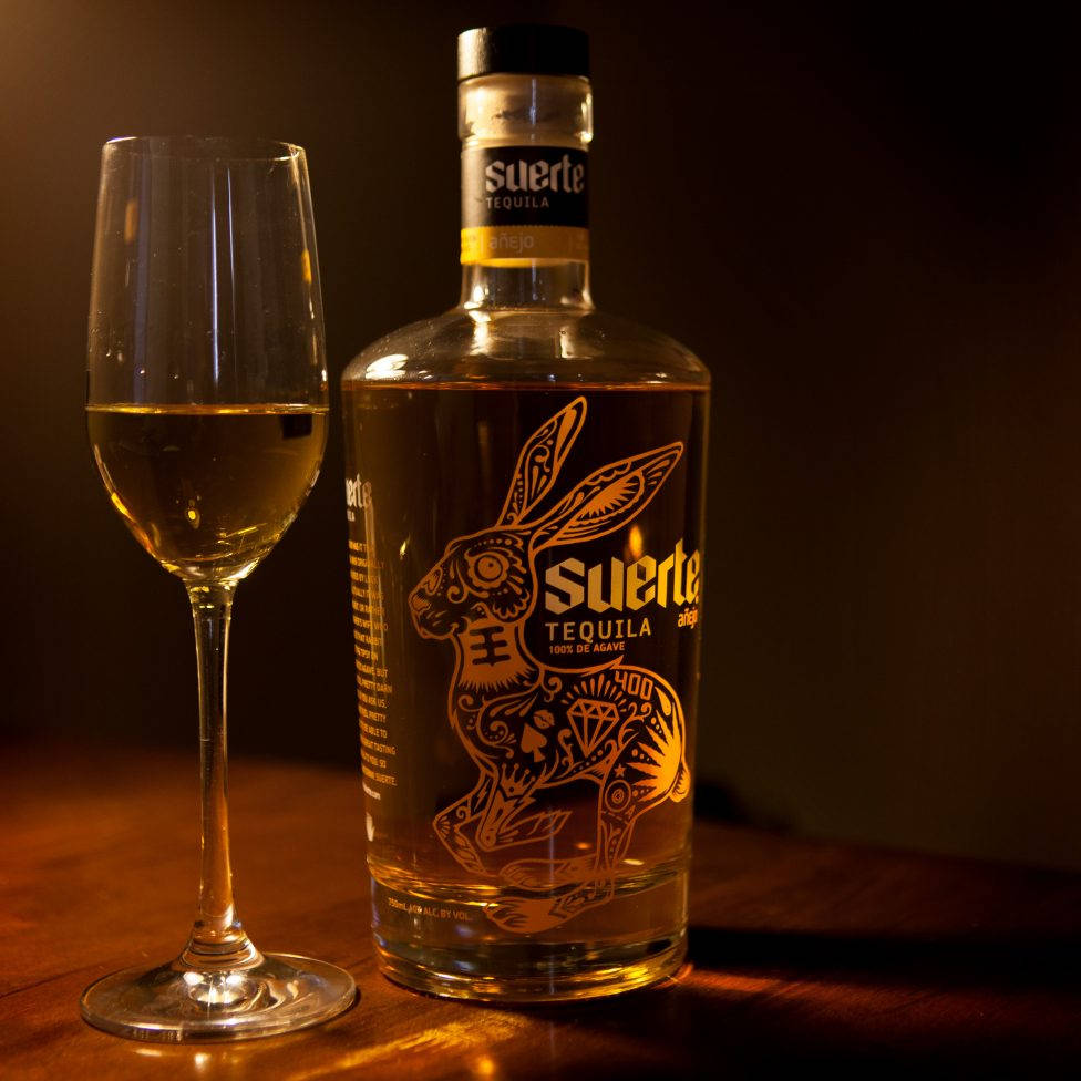 Suerte Tequila And A Wine Grass Wallpaper