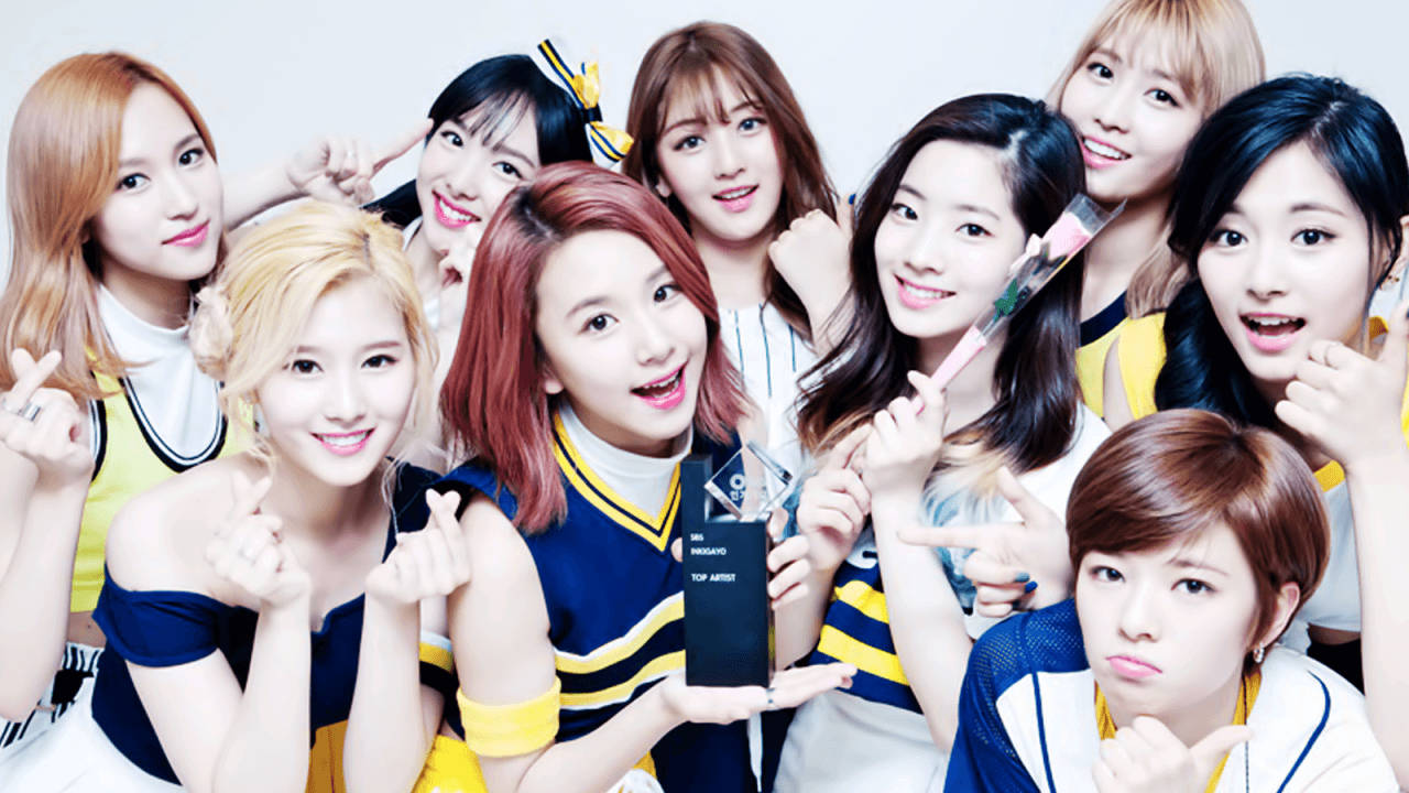 Super Popular Girl-group Twice Are Sizzling In Their Blue And Yellow Outfits! Wallpaper