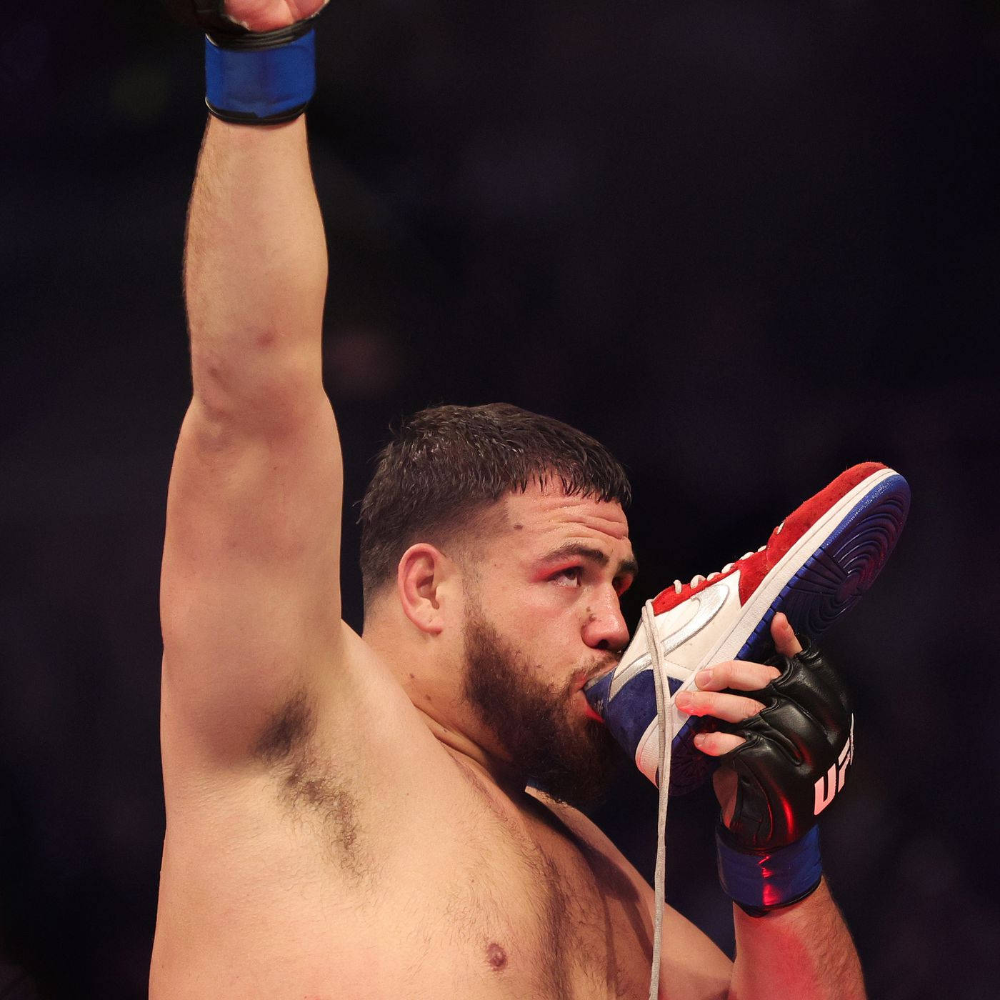 Tai Tuivasa Drinking From Shoe With Raised Arm Wallpaper