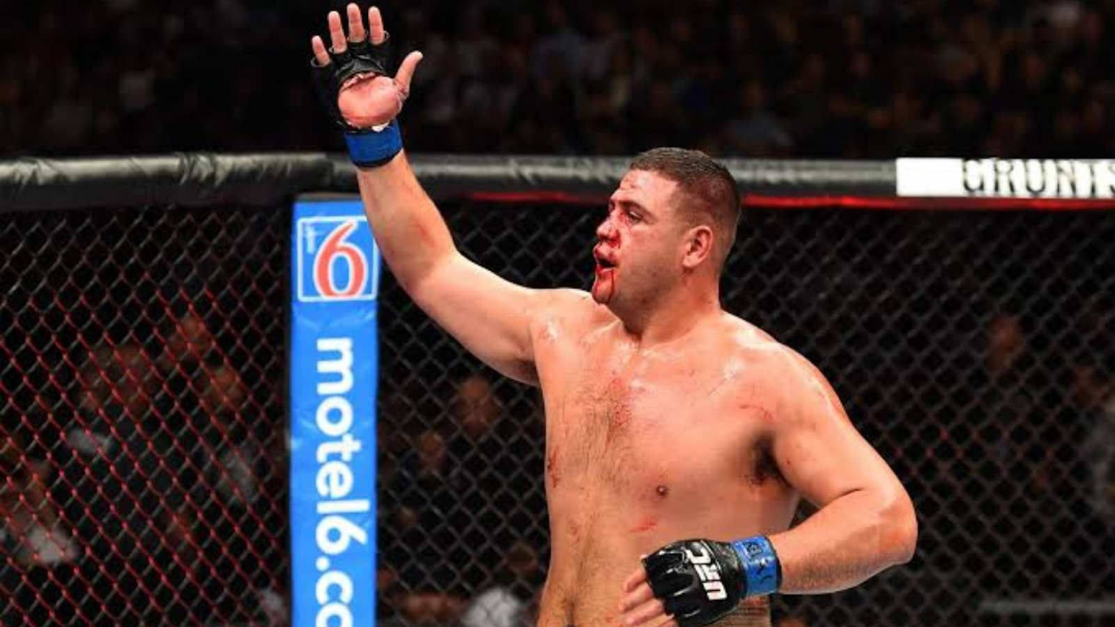 Tai Tuivasa With Hand Raising Up Wallpaper