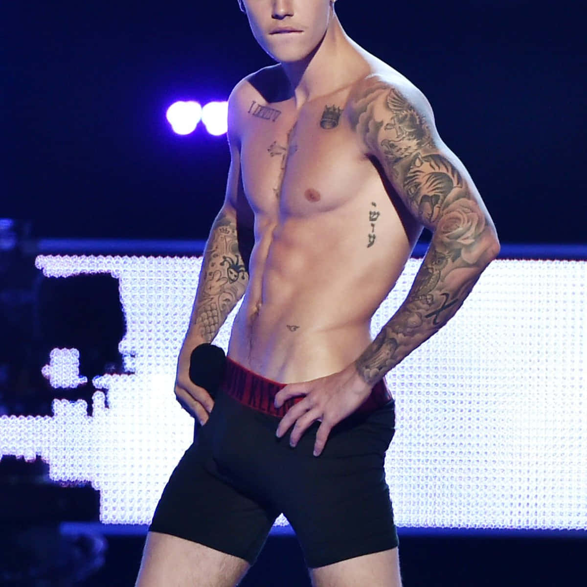 Tattooed Hot Teen Boy On Stage Wallpaper