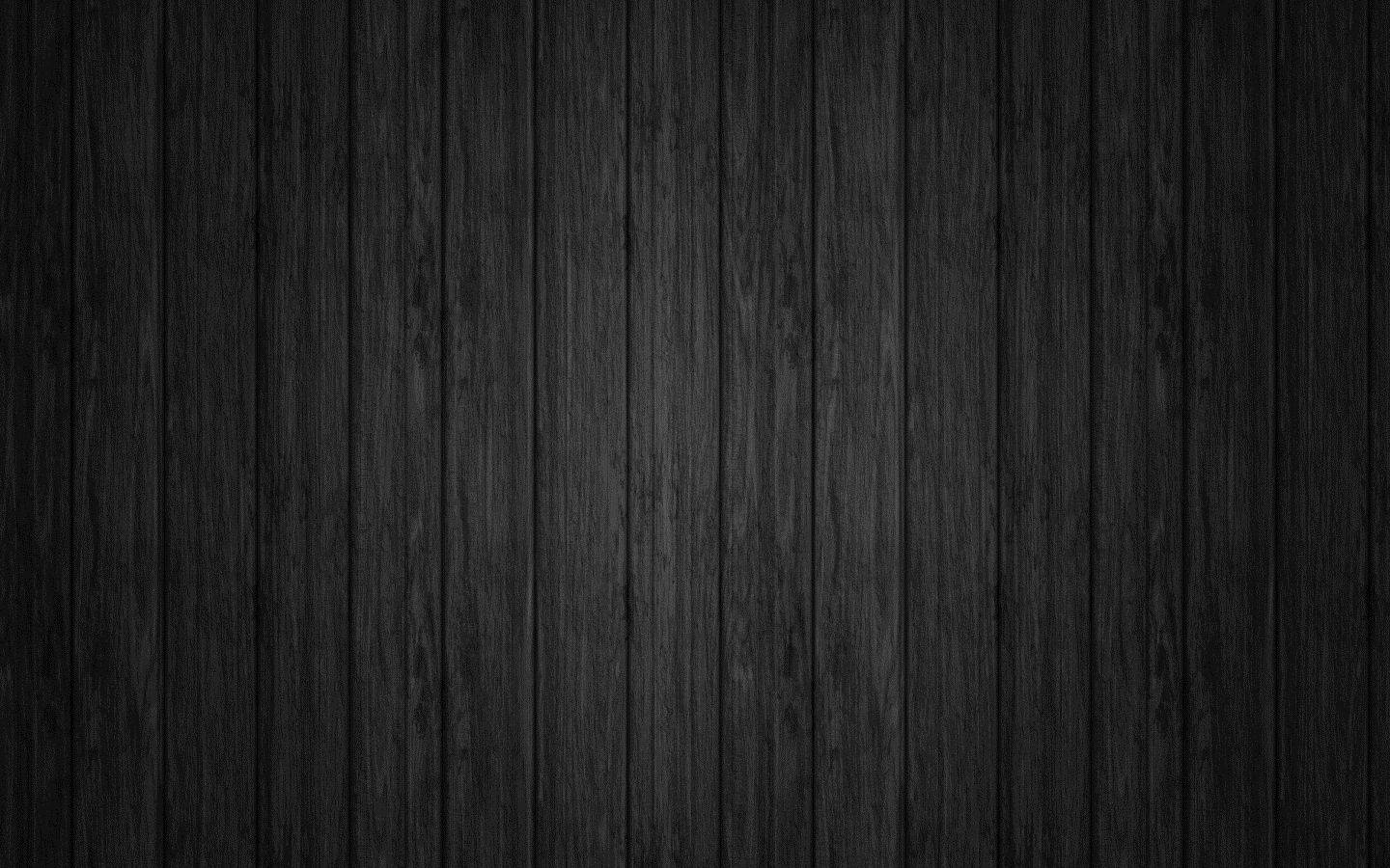 Tech Style - Black Mac On Wooden Table Wallpaper