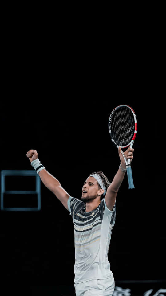 Tennis Player Celebrating Victory Wallpaper