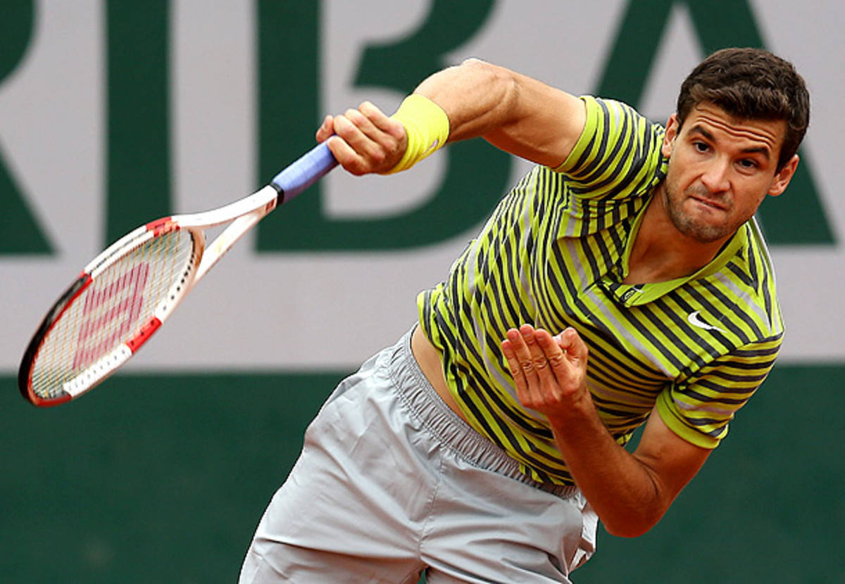 Tennis Star Grigor Dimitrov Looking Vibrant In Neon Striped Shirt Wallpaper