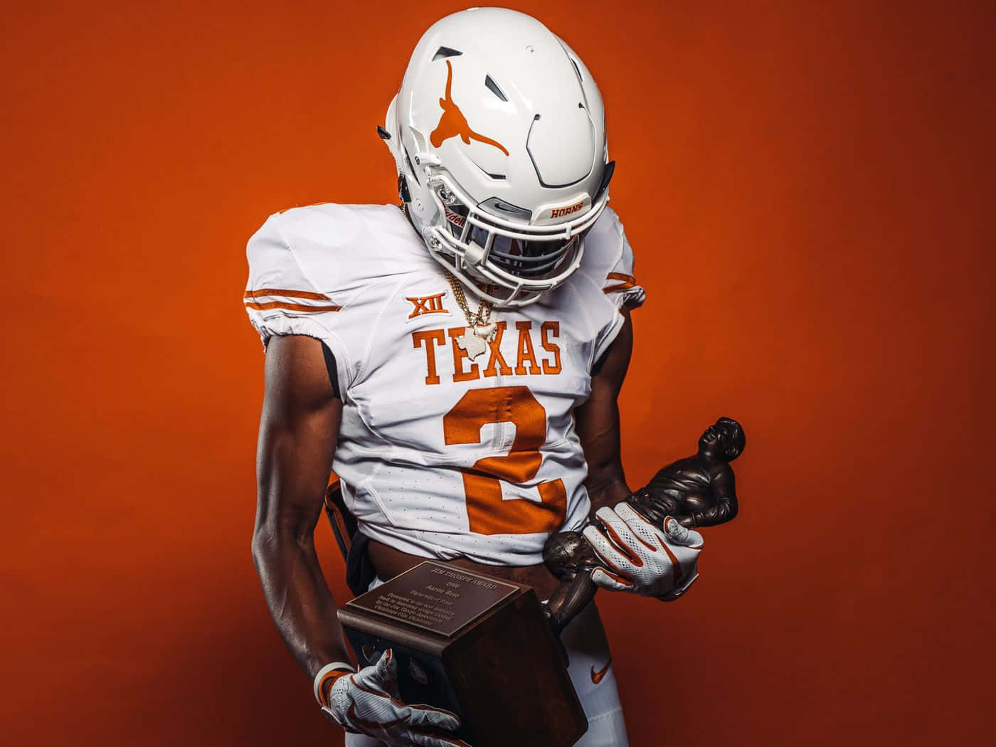 Texas Football Holding Trophy Wallpaper