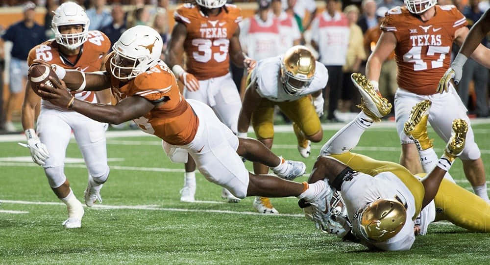 Texas Football Tackling Field Wallpaper