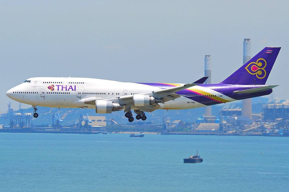 Thai Airways Airplane Above The Ocean Wallpaper