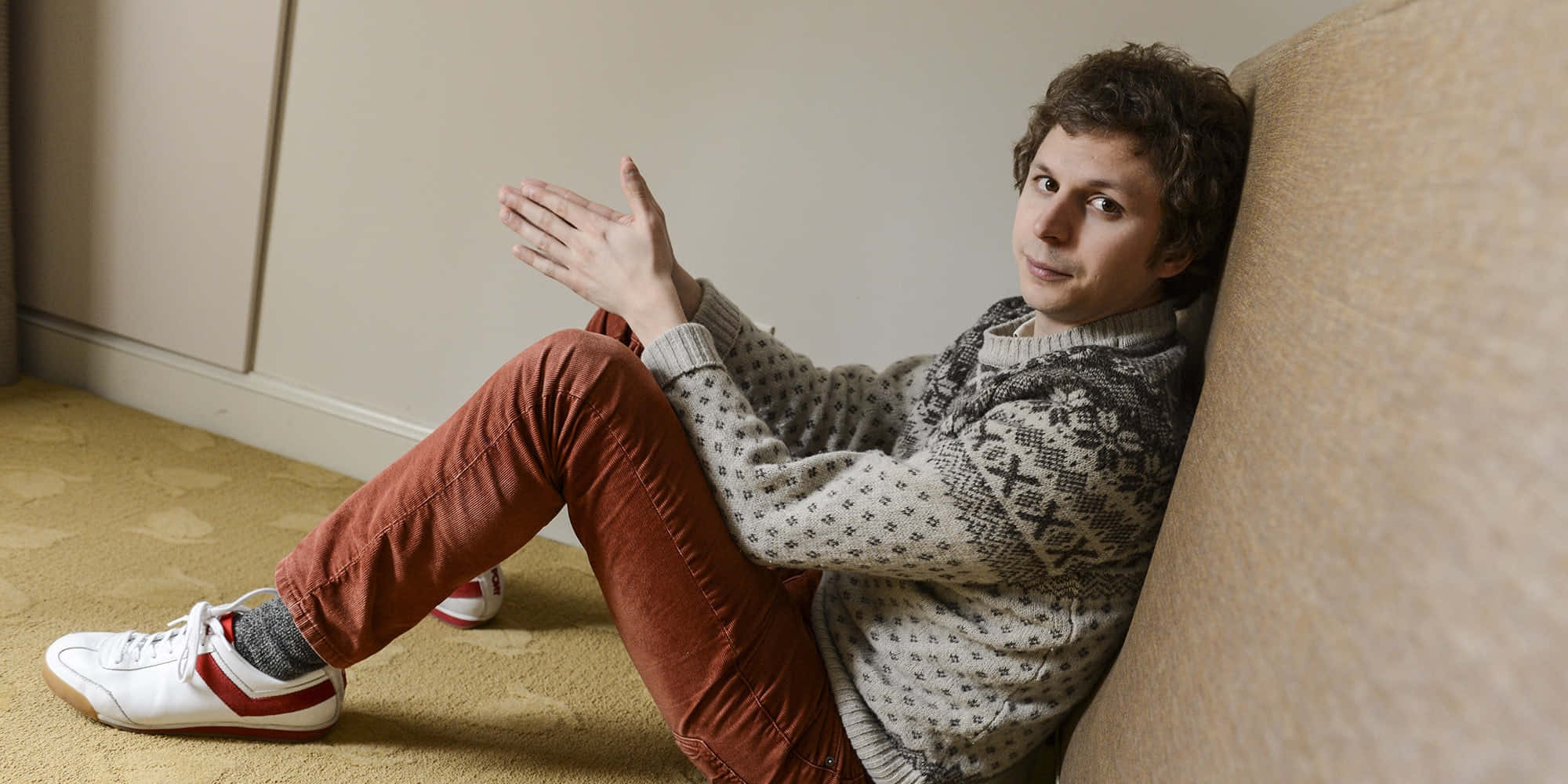 The Talented Michael Cera Gracefully Posing For A Snapshot Wallpaper