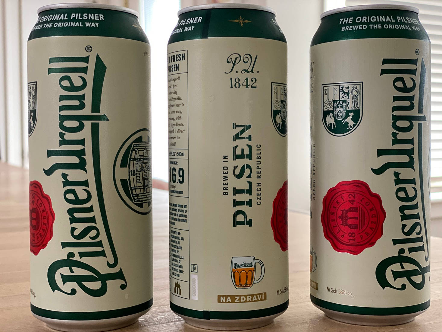 Three Can Of Pilsner Urquell Wallpaper