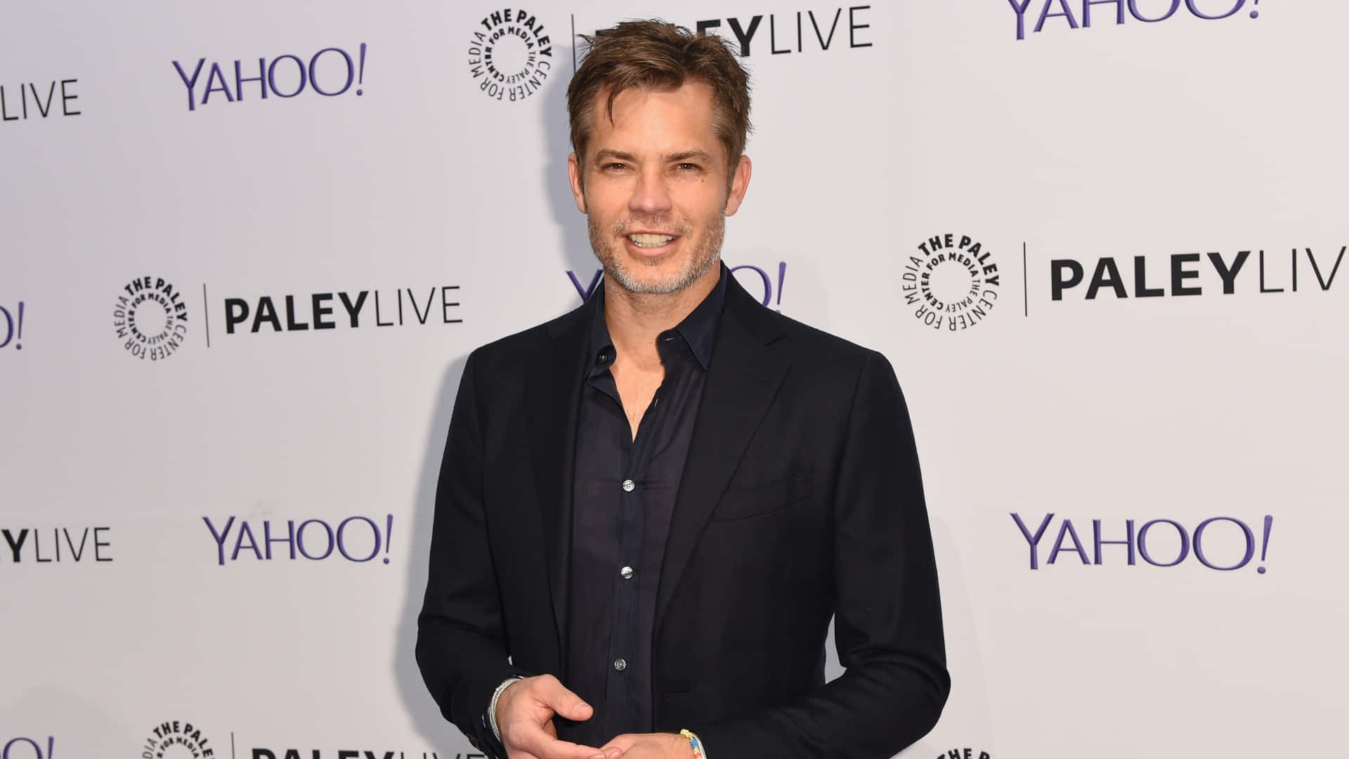Timothy Olyphant Striking A Pose For A Photoshoot Wallpaper