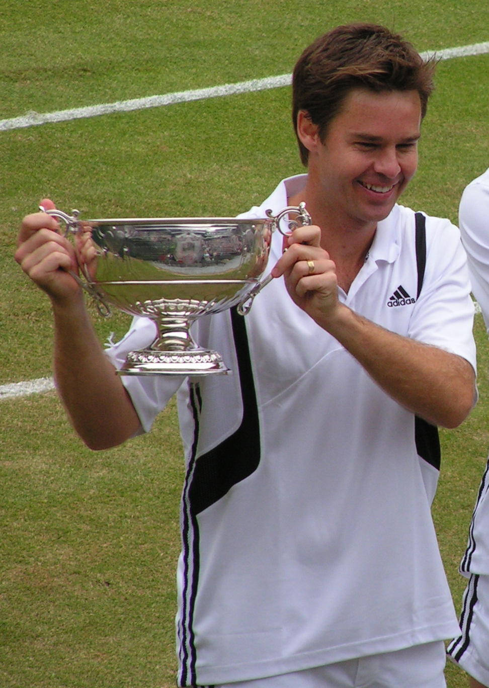 Todd Woodbridge Raising Wimbledon Doubles Cup Wallpaper