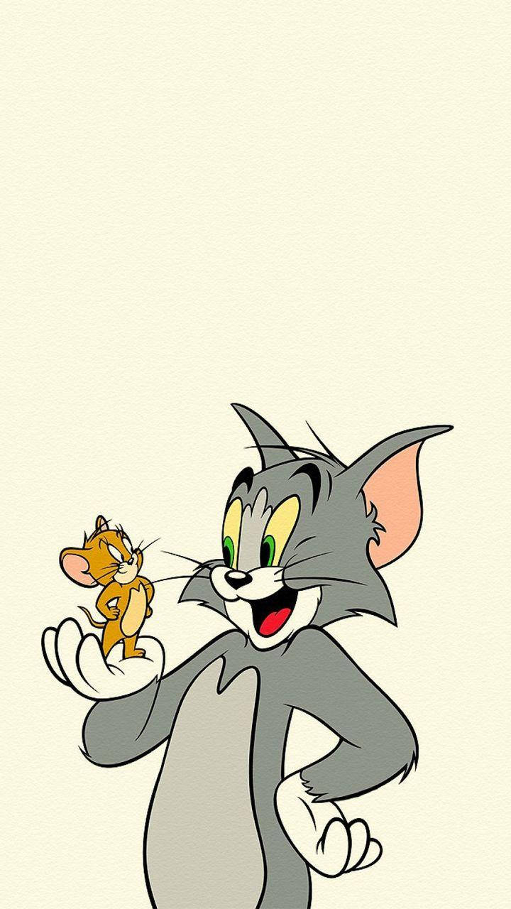 Tom And Jerry Cartoon Pastel Yellow Wallpaper