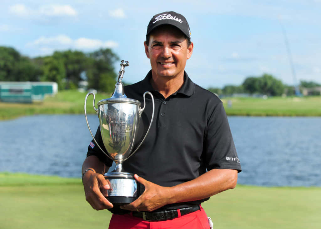 Tom Pernice Jr. Holding Trophy Wallpaper