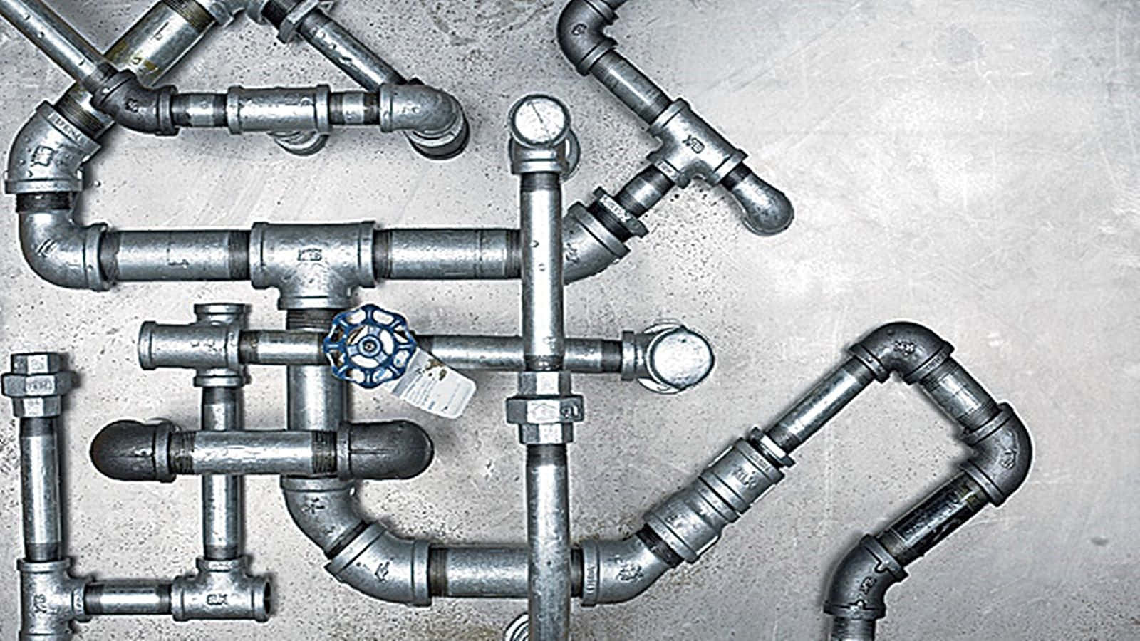 Top View Plumbing Pipe System Wallpaper