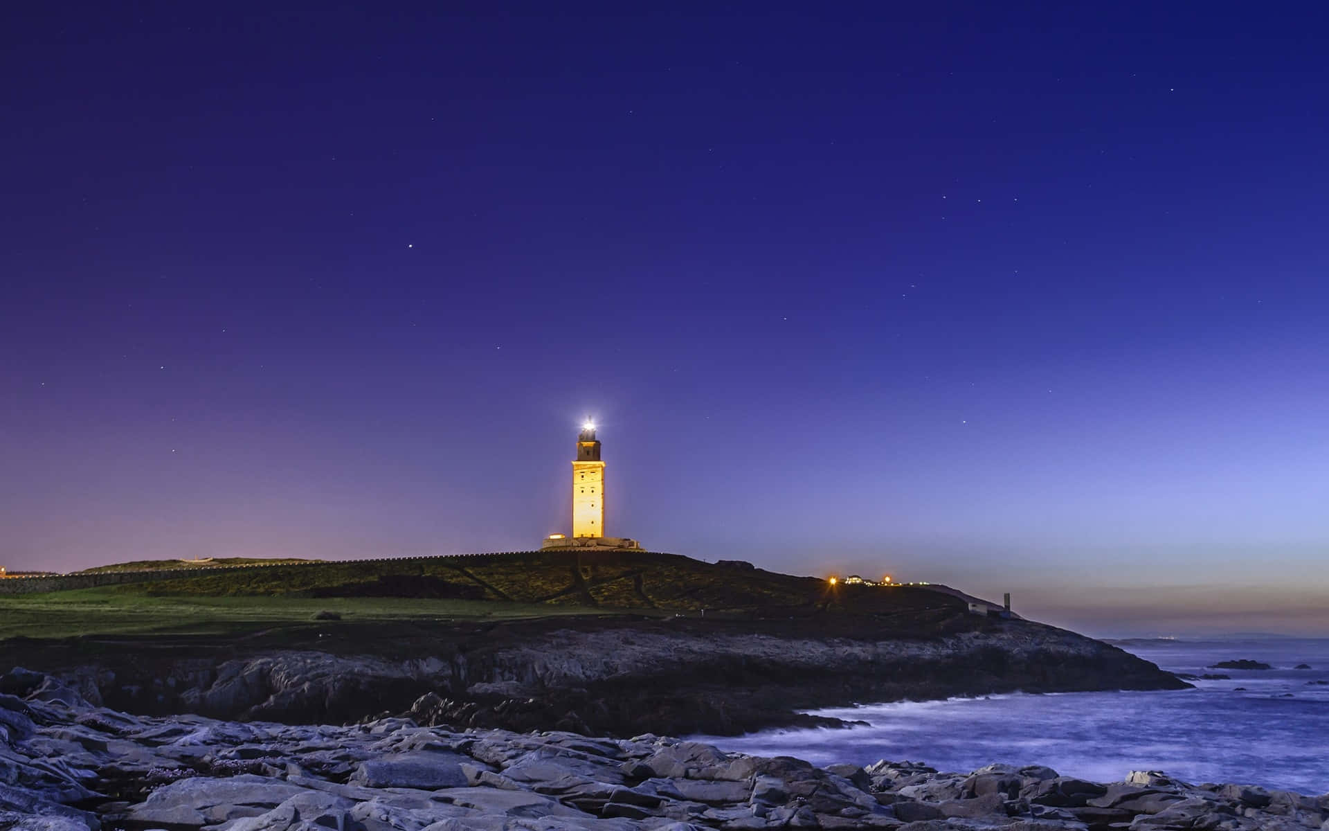 Tower Of Hercules At Night Blue Aesthetic Desktop Wallpaper