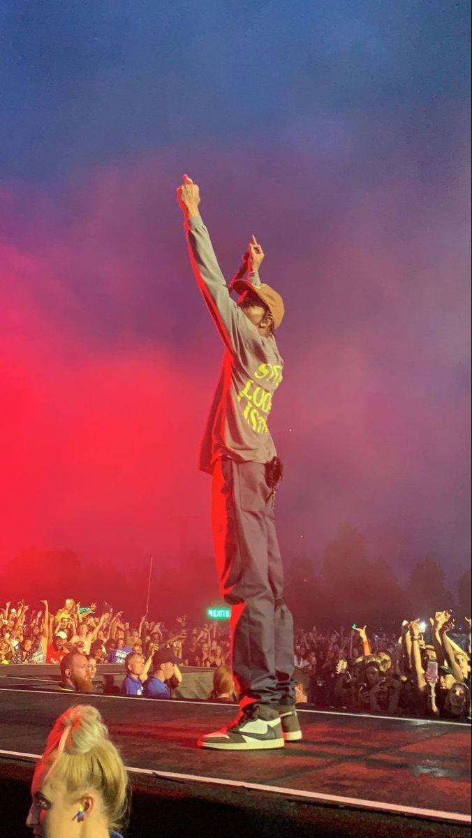Travis Scott Aesthetic Photo On An Outdoor Stage Wallpaper