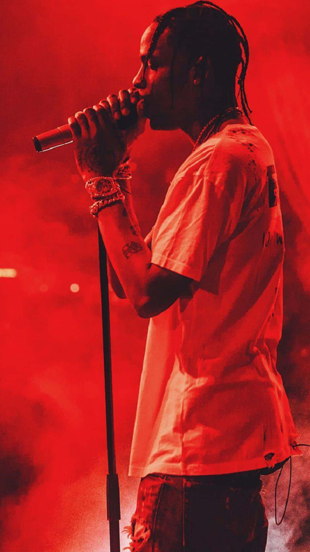 Travis Scott Lights Up An Arena At One Of His Electrifying Concerts Wallpaper