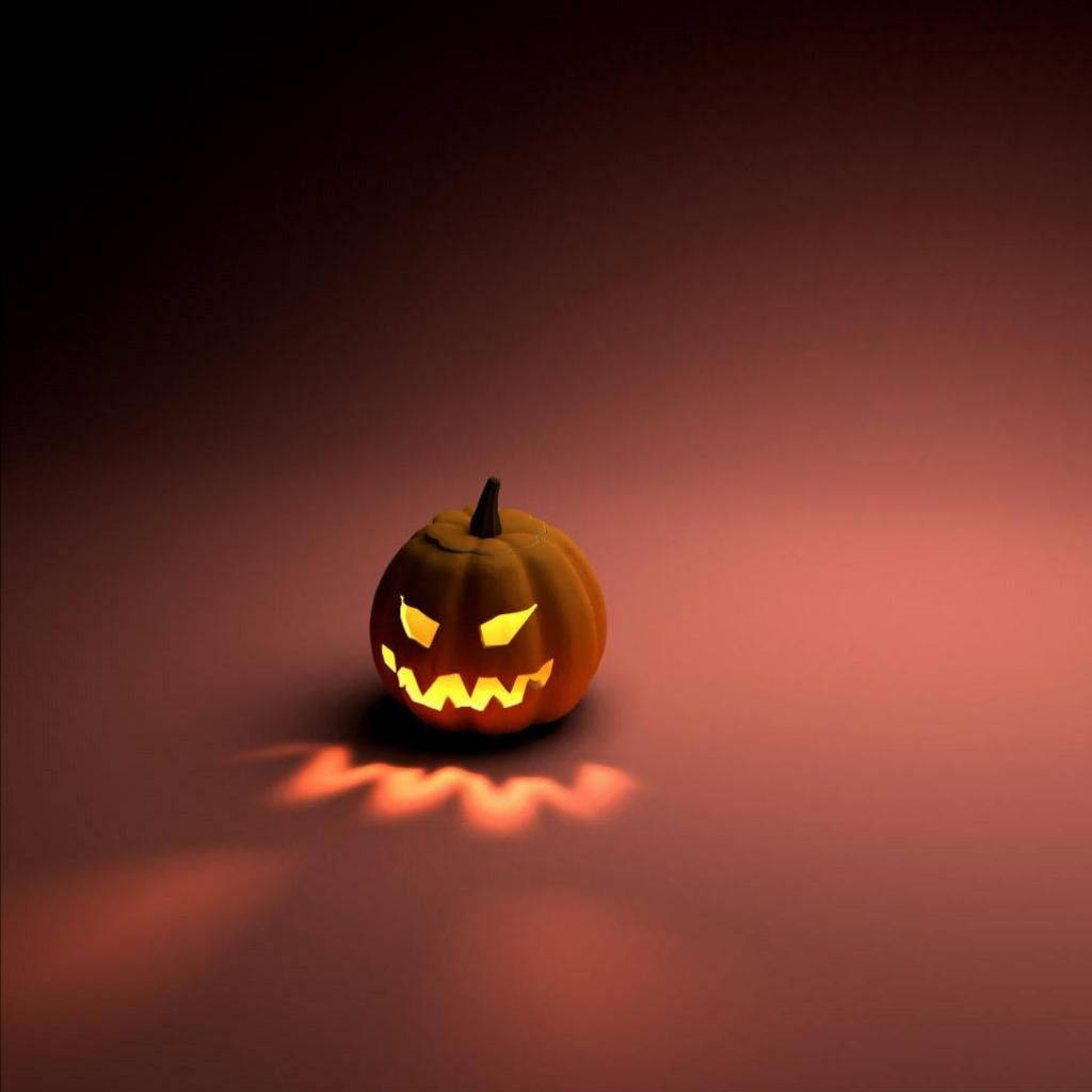 Trick Or Treat! Show Off Your Halloween Spirit With This Festive Ipad Wallpaper. Wallpaper