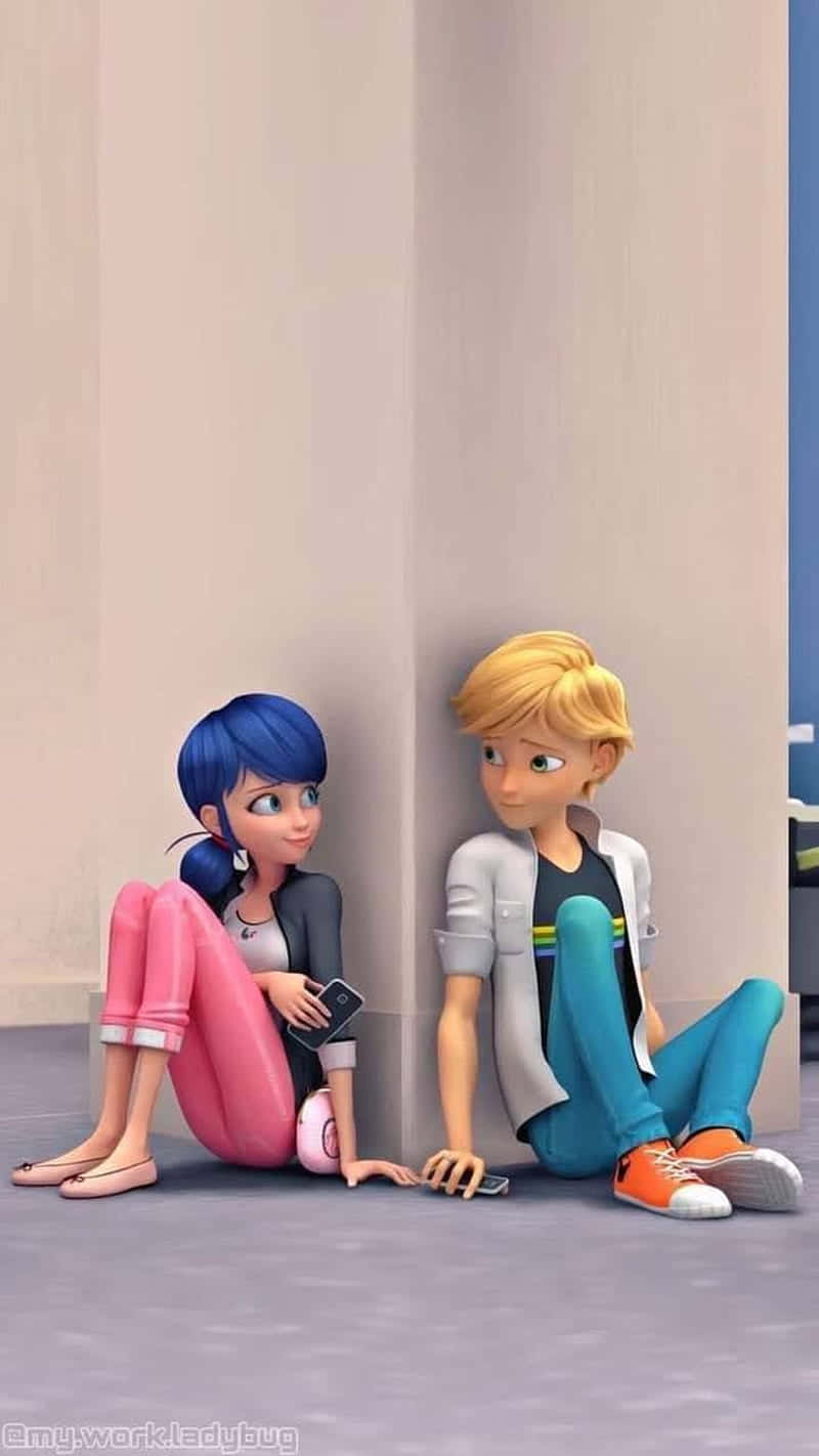 Two Cartoon Characters Sitting On The Floor Wallpaper