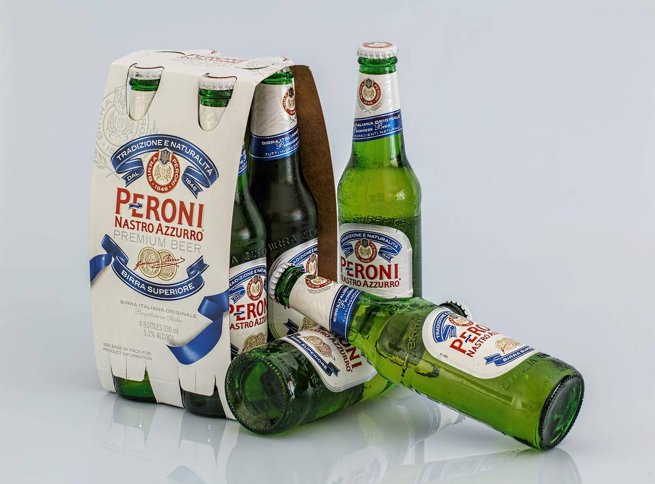 Unboxing Of A Six-pack Case Of Peroni Beer Wallpaper