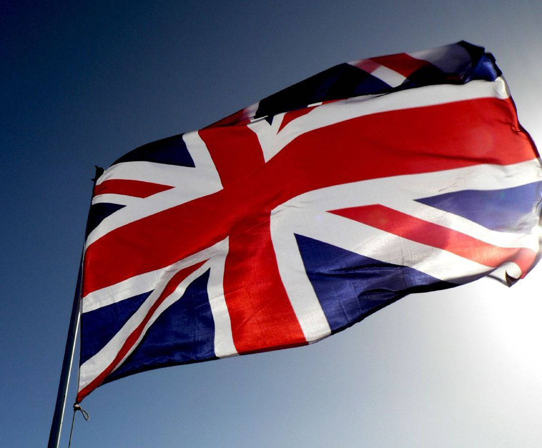 United Kingdom Flag With Blue Sky Wallpaper
