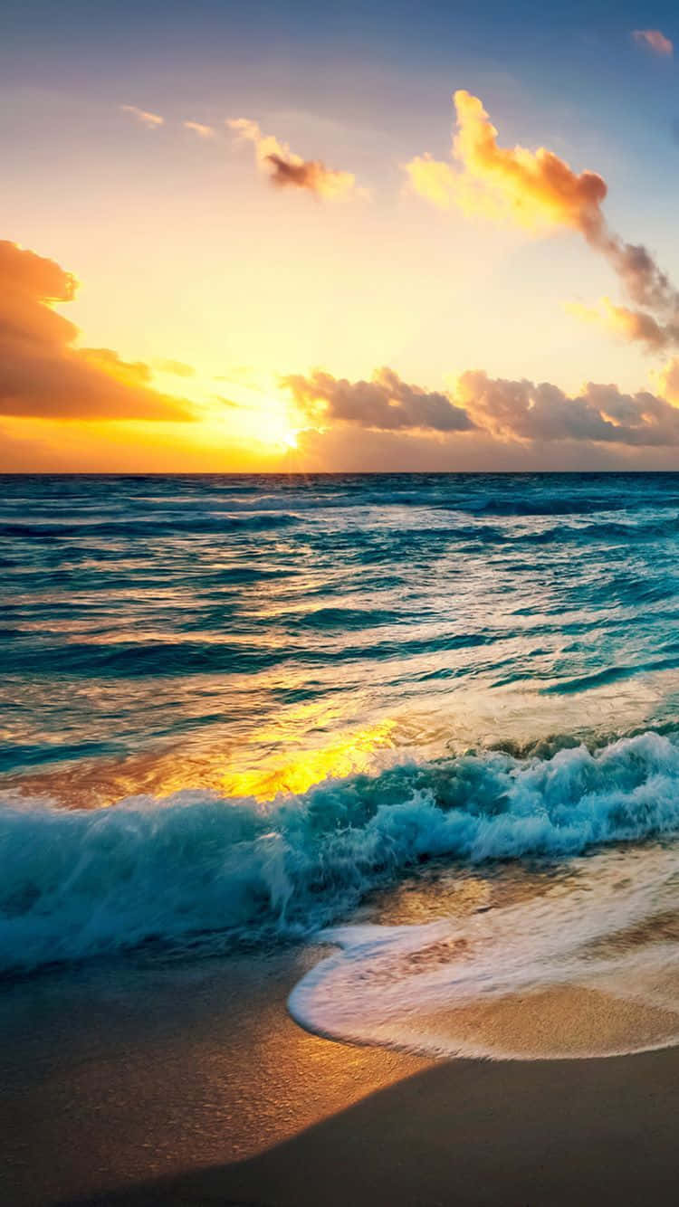 Unparalleled Sunset View On The Beach Where Sand Sparkles Wallpaper