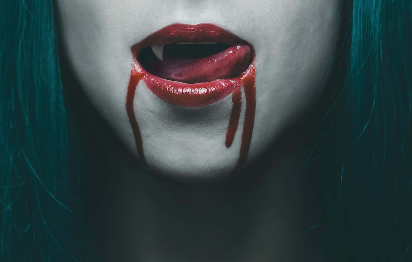 Unsettling Image Of A Bloody Mouth With Tongue Out Wallpaper