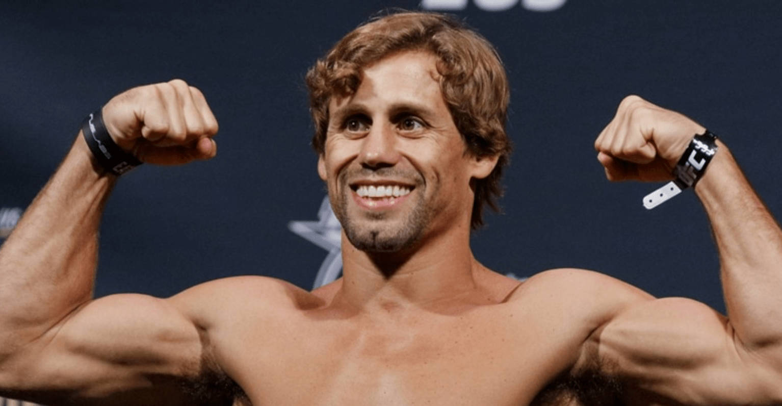 Urijah Faber Smiling And Flexing Wallpaper