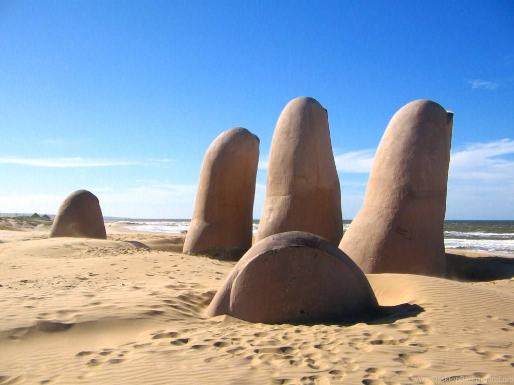 Uruguay Playa Mansa Hand Sculpture Wallpaper