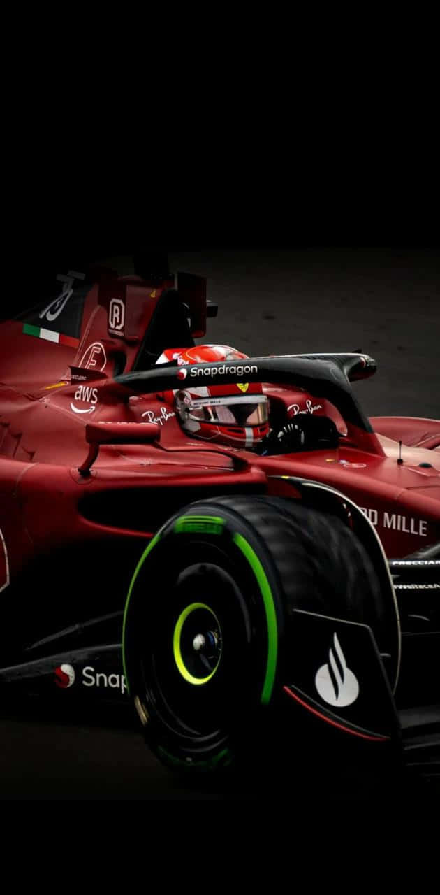 Vettel Racing For Ferrari F1 Wallpaper