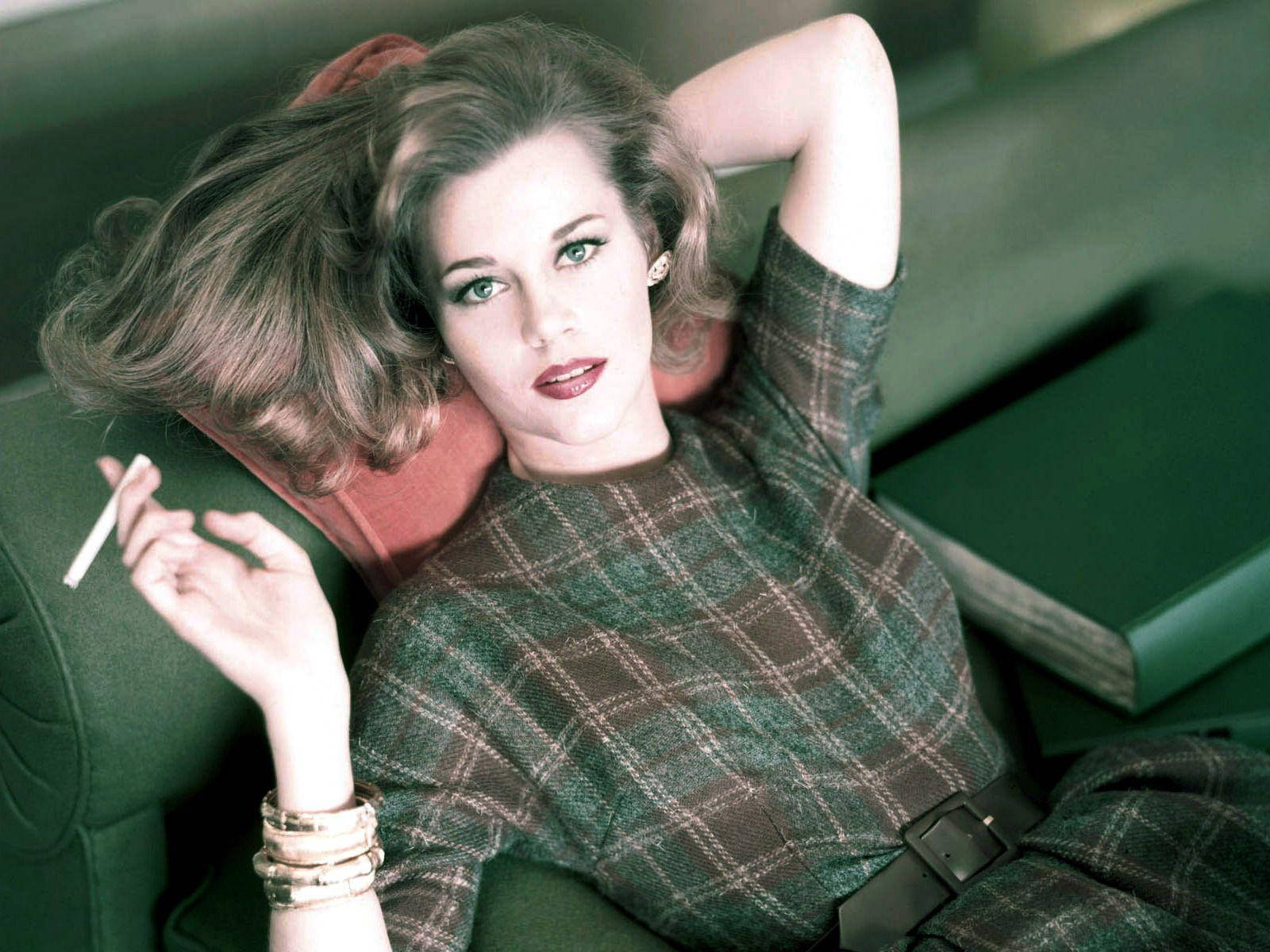 Vintage Glamour - American Actress Jane Fonda Posing With Cigarette Wallpaper