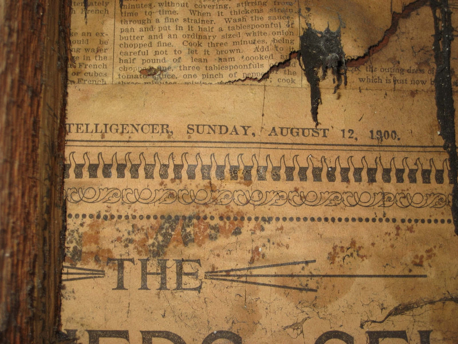 Vintage Newspaper With Tear Wallpaper