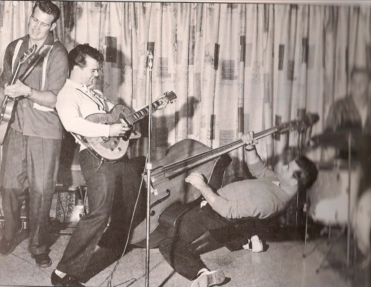 Vintage Rockabilly Band Performance Wallpaper