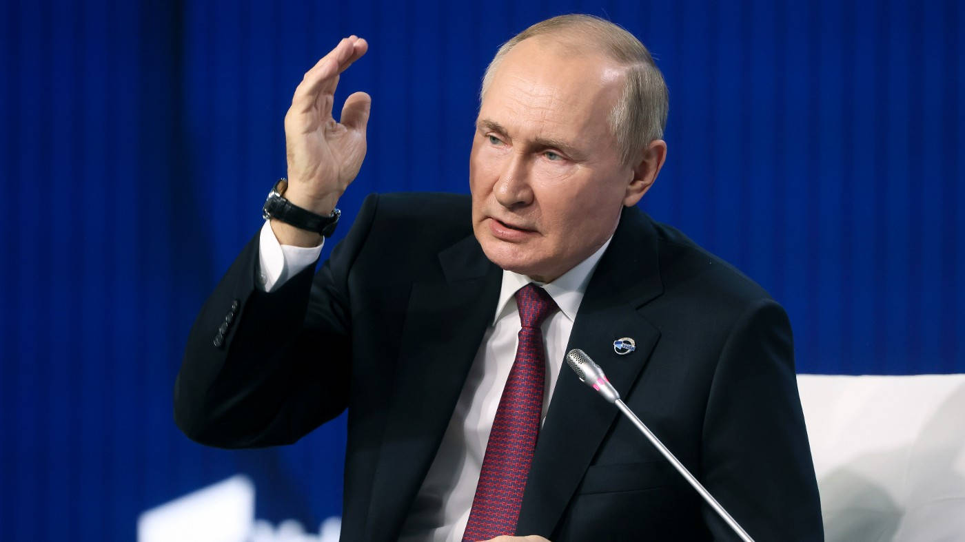 Vladimir Putin With Raised Hand Wallpaper