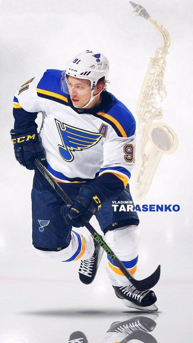 Vladimir Tarasenko Gliding While Holding Hockey Stick With Reflection And Saxophone Wallpaper