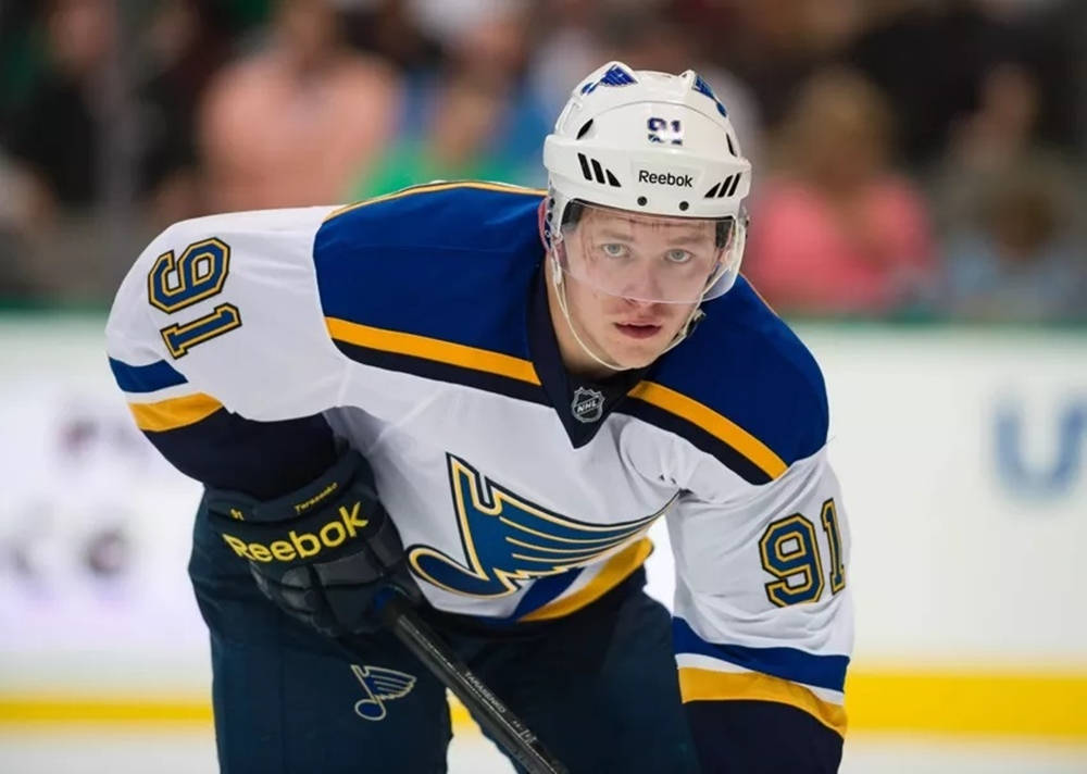 Vladimir Tarasenko Leaning Forward While Holding Hockey Stick Wallpaper