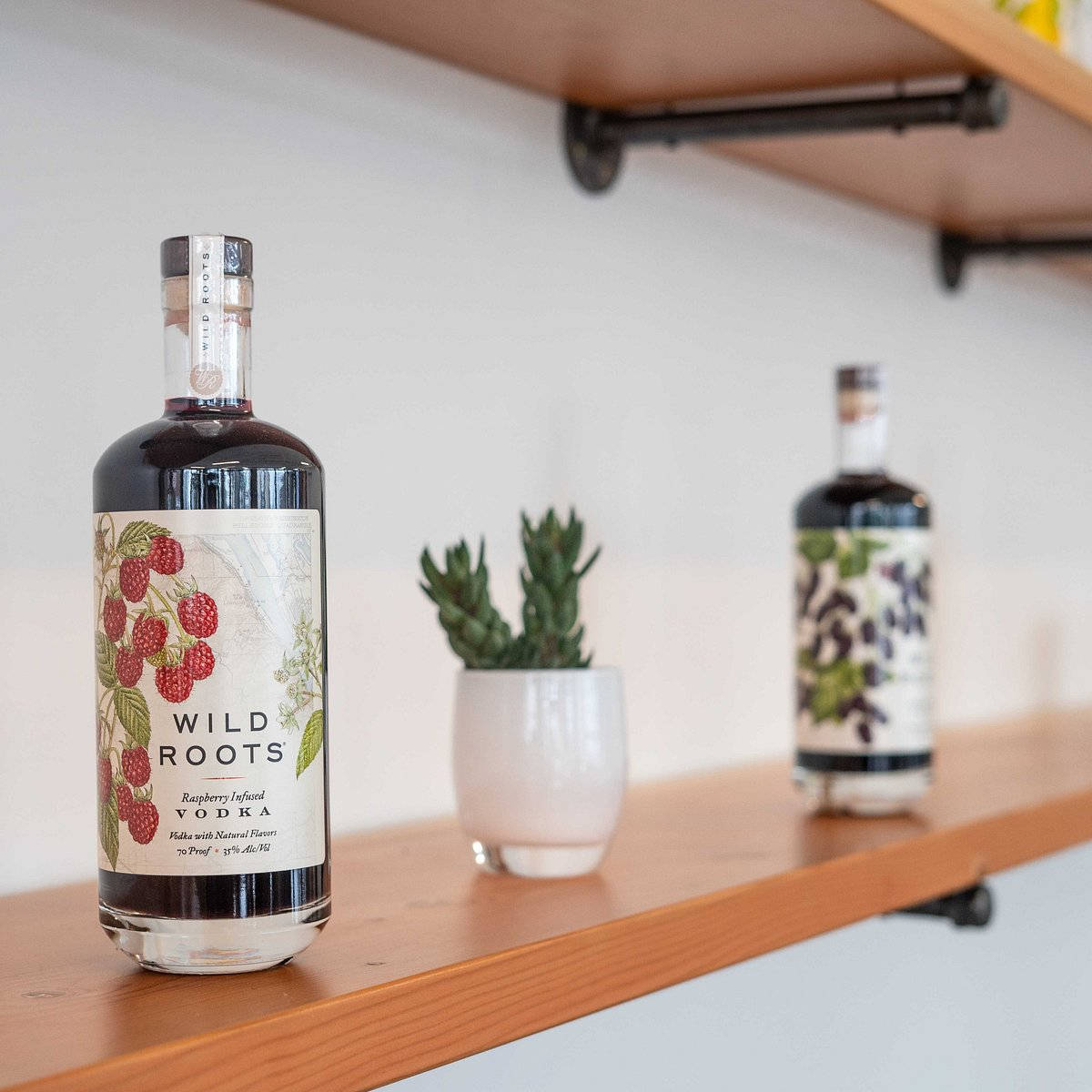 Wild Roots Huckleberry Vodka Wooden Rack Wallpaper