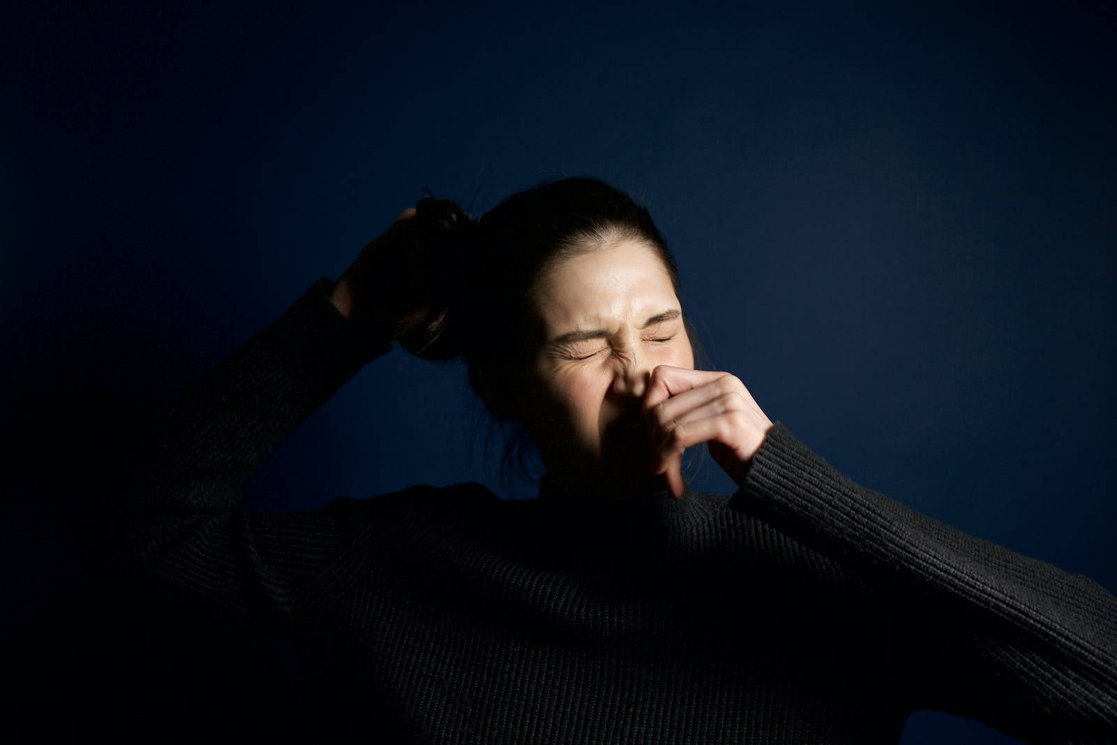 Woman Holding Sneeze Wallpaper