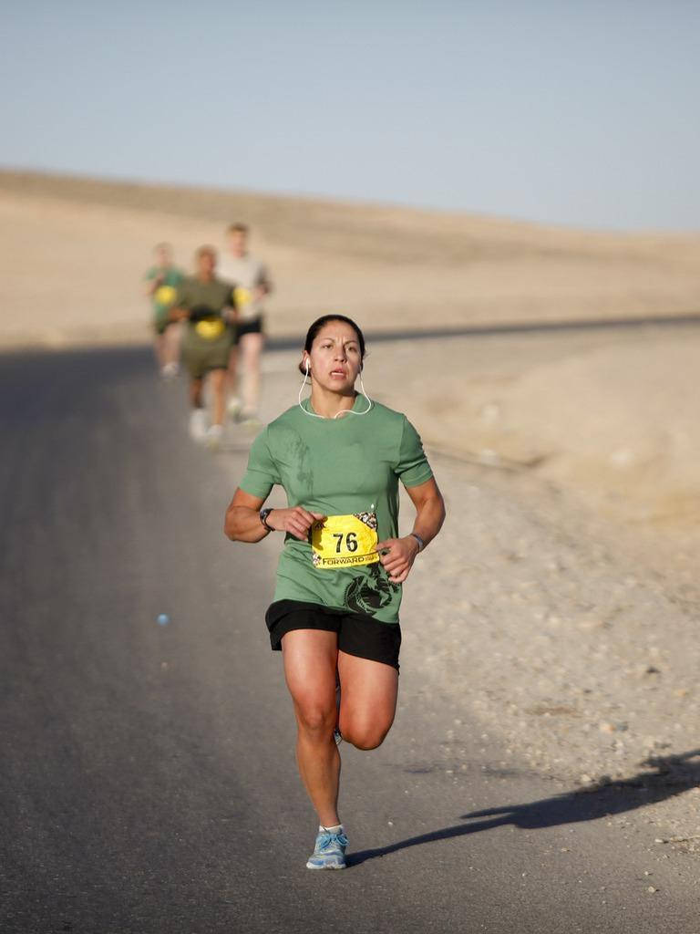 Woman In A Marathon Wallpaper