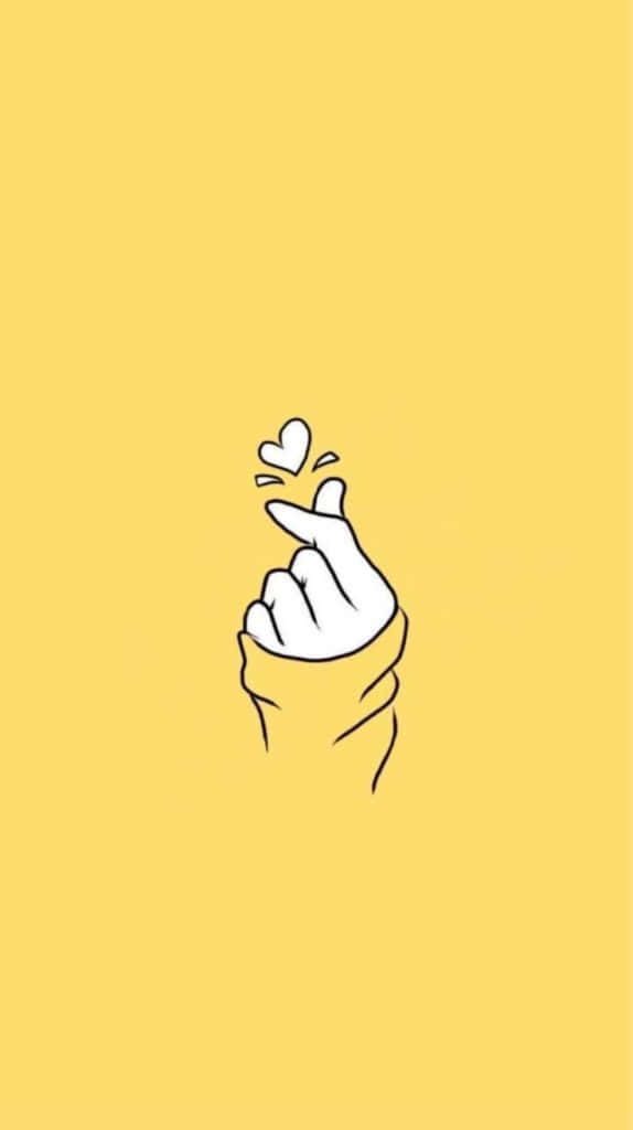 Yellow Aesthetic Phone Hand Heart Wallpaper