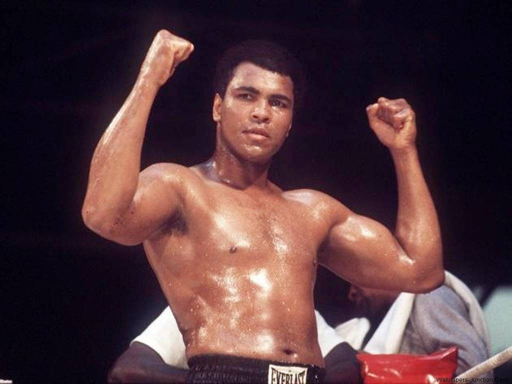 Youthful And Victorious Muhammad Ali Wallpaper