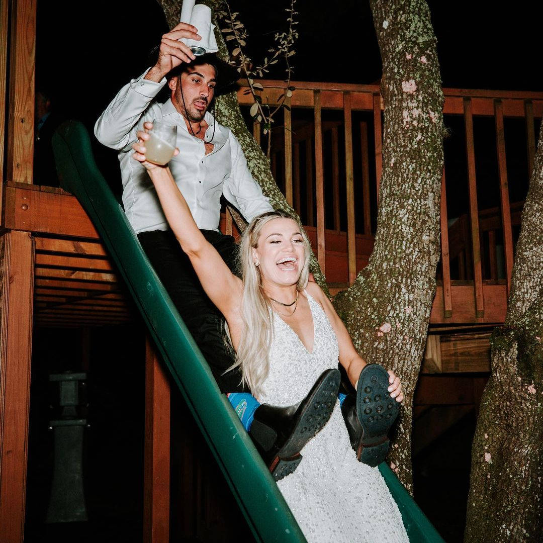 Zach Eflin And Wife On Slide Wallpaper