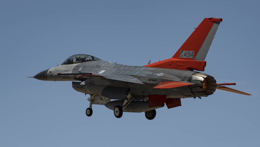 A 4k Fighter Plane Taking Off In A Magnificent Display Of Strength Wallpaper