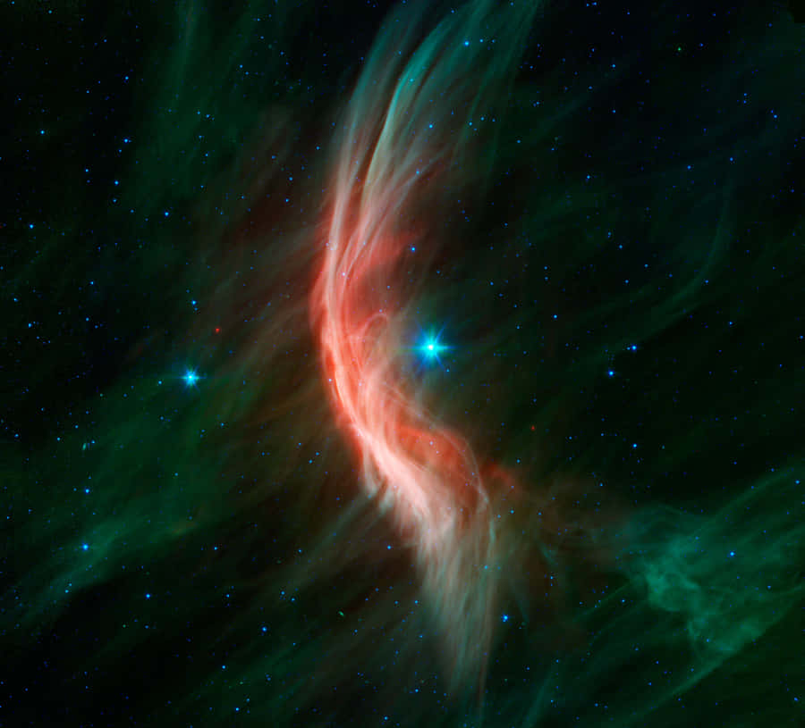 A Beautiful Landscape Of Stars And Colors In Space Nebula Wallpaper
