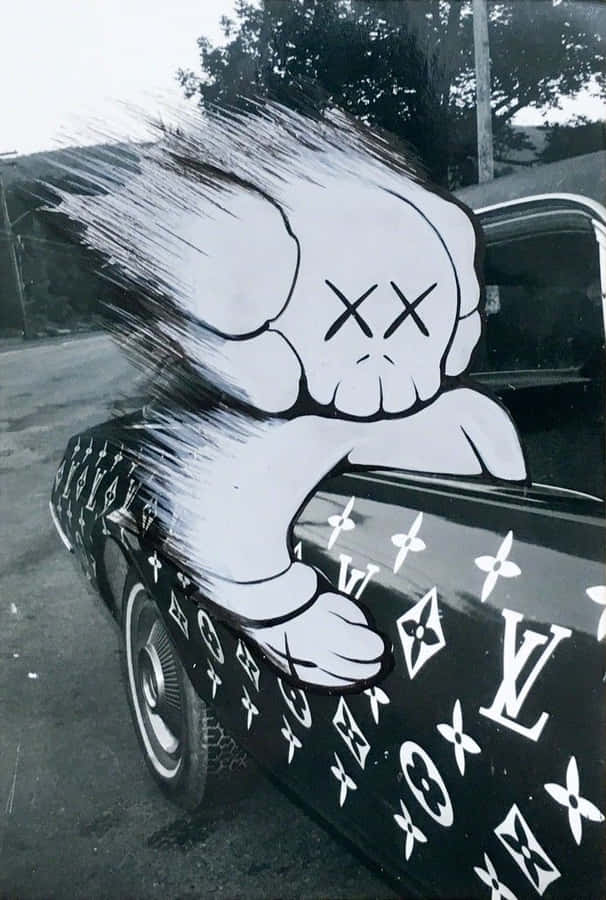 A Black And White Photo Of A Car With A Graffiti On It Wallpaper