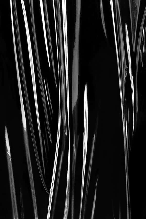 A Black And White Photo Of A Plastic Bag Wallpaper