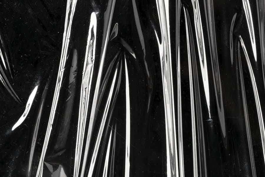 A Black Plastic Bag With A Silver Stripe Wallpaper