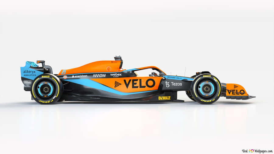 A Blue And Orange Racing Car Is Shown Wallpaper